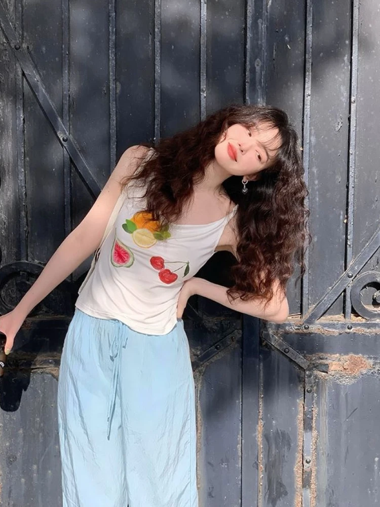 เสื้อกล้ามคอวีพิมพ์ลายผลไม้สีสันสดใสสไตล์อเมริกันหวานซ่อนเปรี้ยวสำหรับผู้หญิง