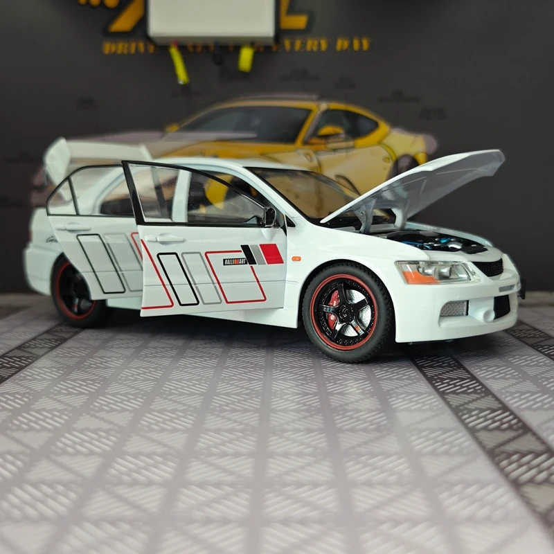 Modelo de aleación de coche de rally Mitsubishi EVO de 9ª generación a escala 1:24, puertas y capó del motor se pueden abrir.