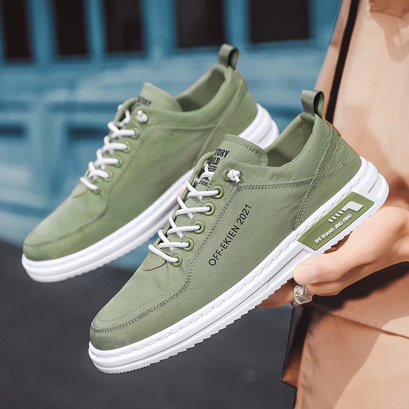 حذاء قماش الرجال أحذية رياضية عادية تنفس المشي الشقق الدانتيل متابعة سكيت المدربين موضة خفيفة الوزن رجل أحذية مفلكنة