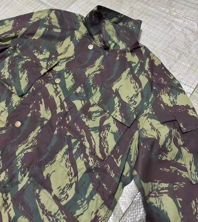 Outdoor camouflage clothing, including jacket and pants