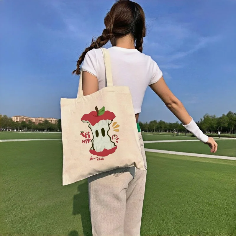 

1pc Cartoon Apple Core Graphic Canvas Tote Bag Double Sided Print Cute Minimalist Large Capacity Casual Shoulder Bag