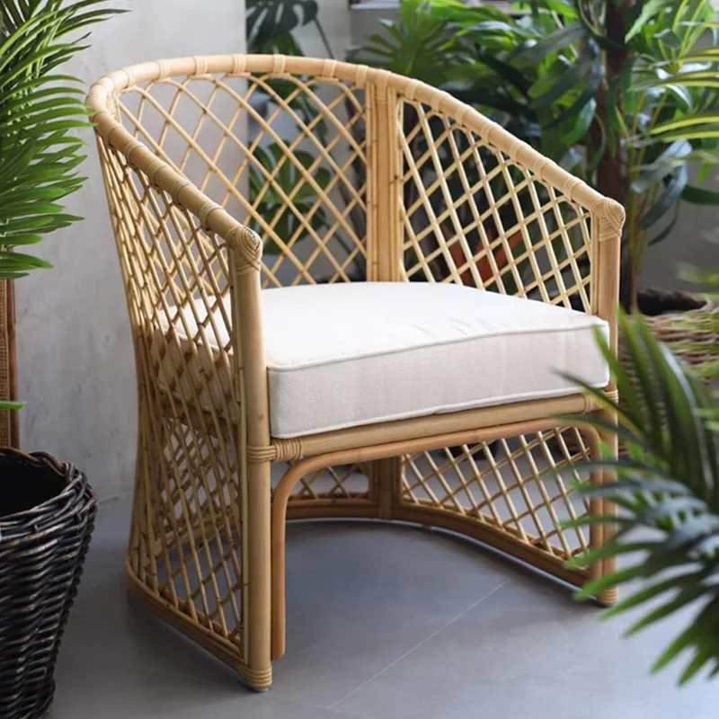 

Leisure rattan chair balcony hollow single sofa ins natural rattan weaving simple Japanese rattan chair weaving homestay