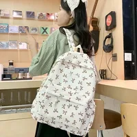 Mochila de estudiante de moda con estampado de lazo para niñas y mujeres, mochila escolar con correa ajustable, bolsa de viaje, mochila bonita
