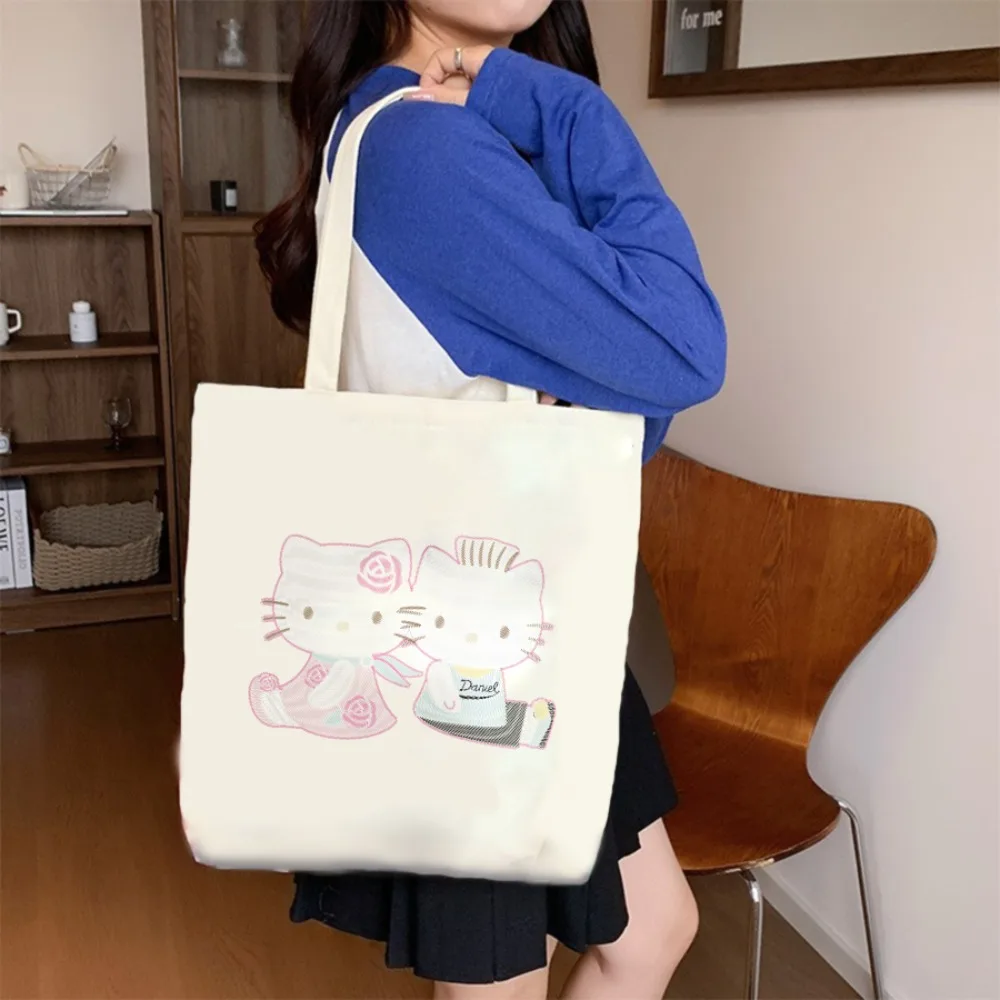 ‌ Bolsa de Lona Hello Kitty, Adorable y Espaciosa, Perfecta para Compras, Escuela y Salidas Diarias