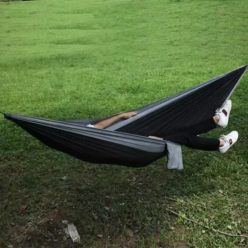 Best-selling outdoor camping hammock with multi-color design and included tie ropes. Camping swing.