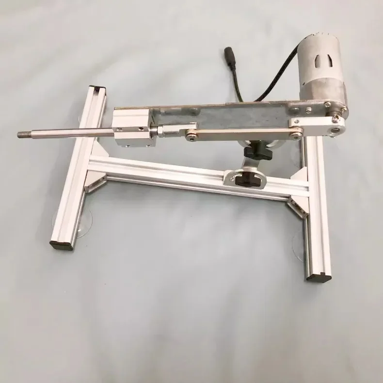 Mini-cannon machine featuring linear reciprocating motion, stepless speed control, and an adjustable-angle base.