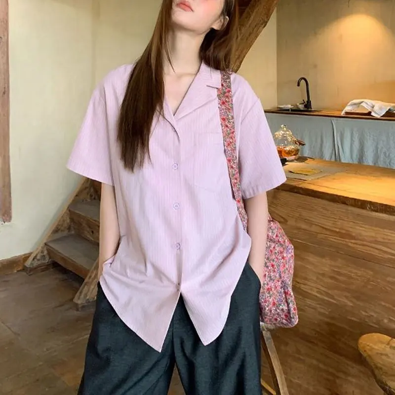 服韓国ストライプブラウスカジュアルターンダウン襟夏新ルーズベーシック半袖スタイリッシュなポケットスプライシングシャツ