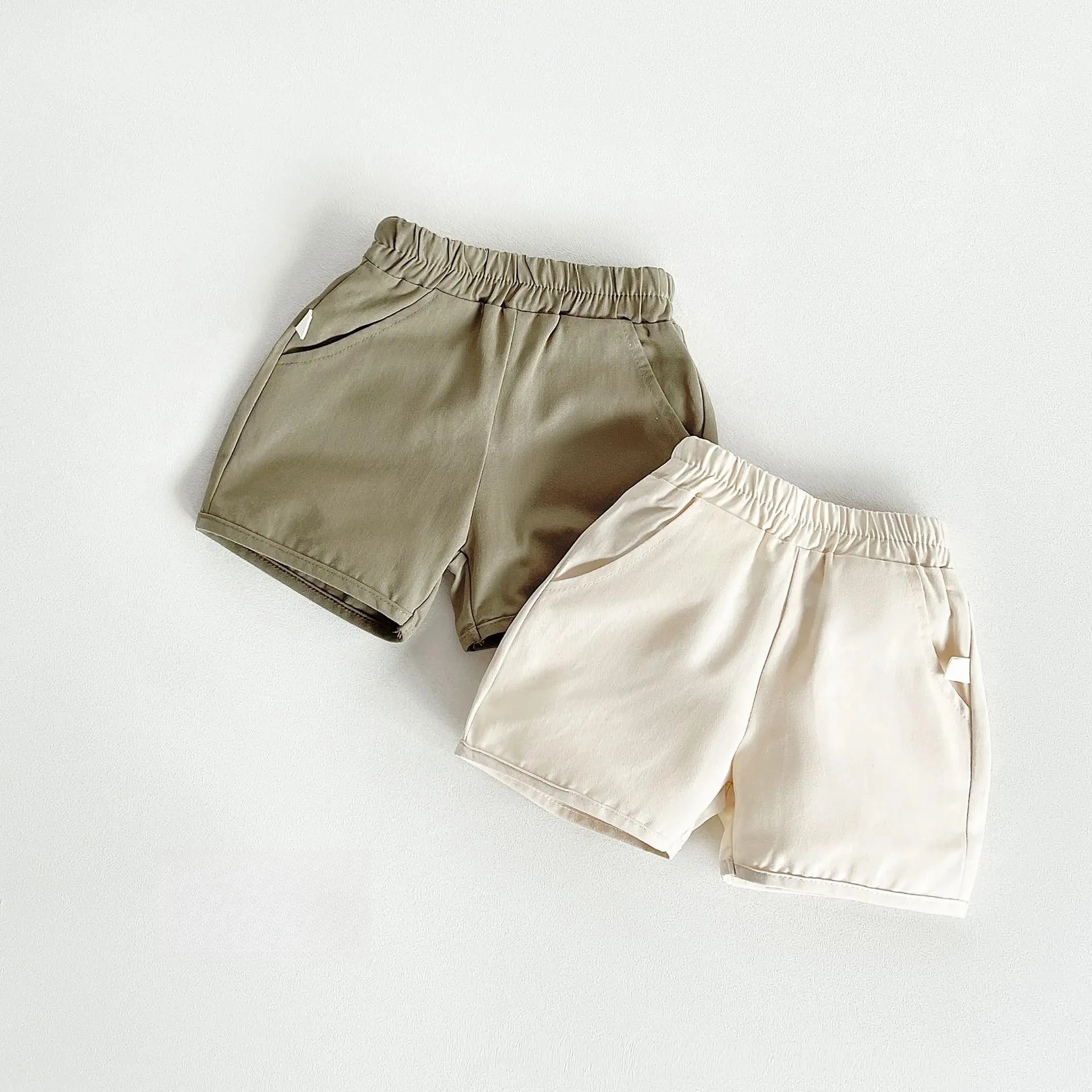 

Летние повседневные хлопковые шорты для девочек и мальчиков 2026 года, два цвета