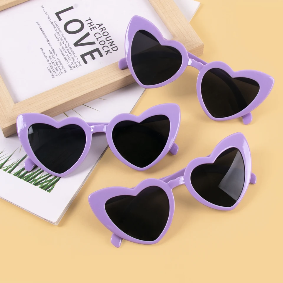 Aviski Lunettes de soleil transparentes en forme de cœur - Sans monture Aviski Lunettes de soleil transparentes en forme de cœur - Sans monture