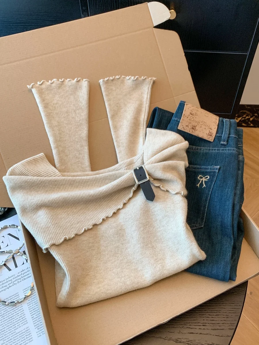 เสื้อถักไหมพรมสำหรับเด็กผู้หญิง ทรงปล่อยชายเสื้อไม่เท่ากัน คอเหลี่ยม ผูกโบว์ แขนยาวทรงบาน นุ่ม ระบายอากาศได้ดี หลายสี