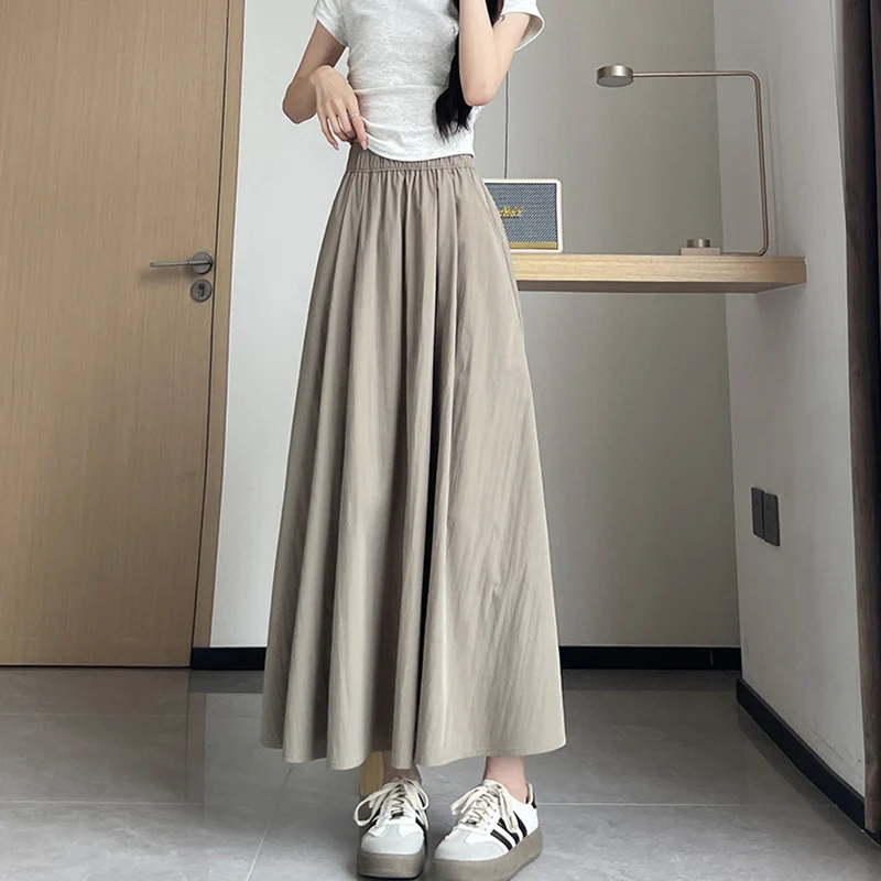 Damskie spódnice w kształcie litery A, plisowane, letnie, z wysokim stanem, szerokie spódnice typu parasol, damskie spódnice 2025, uniwersalne, jednokolorowe, z kieszeniami, długie spódnice.