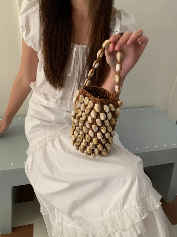 

Летняя коллекция 2026: Женская плетеная сумка-ведро с декором из ракушек, ручной работы, с бисером, для отдыха и отпуска, круглая сумка-бочонок