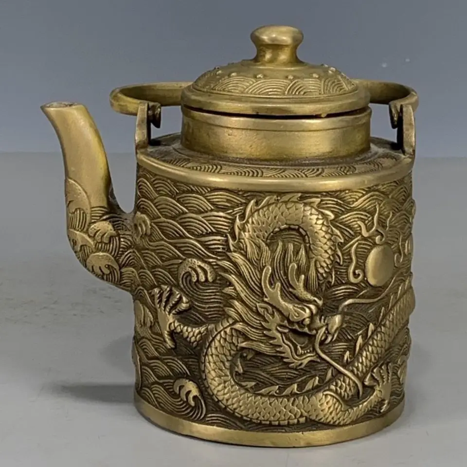 Handed down from ancient times, the authentic Liang Long pot vintage embossed Panlong brass teapot was