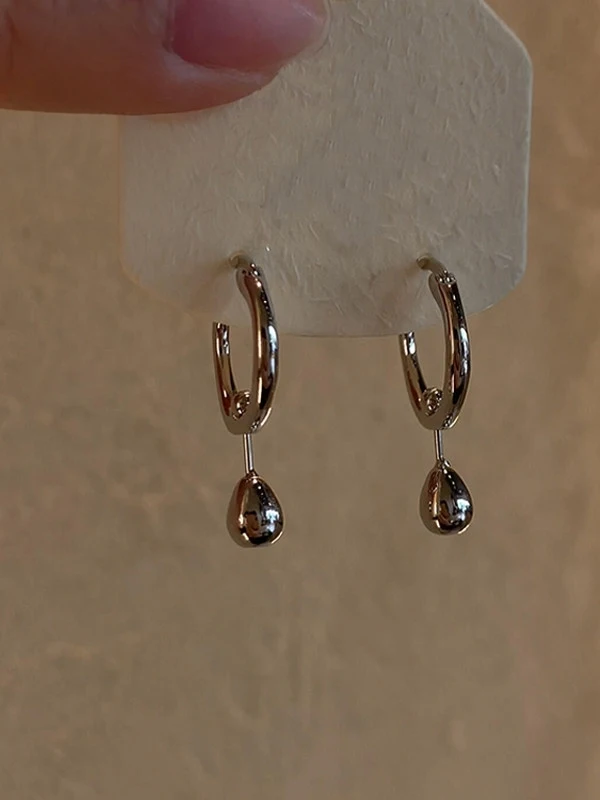 brinco-pendente-gota-d'agua-prateado-estilo-coreano-joia-de-luxo-minimalista-versatil-e-de-alta-estetica
