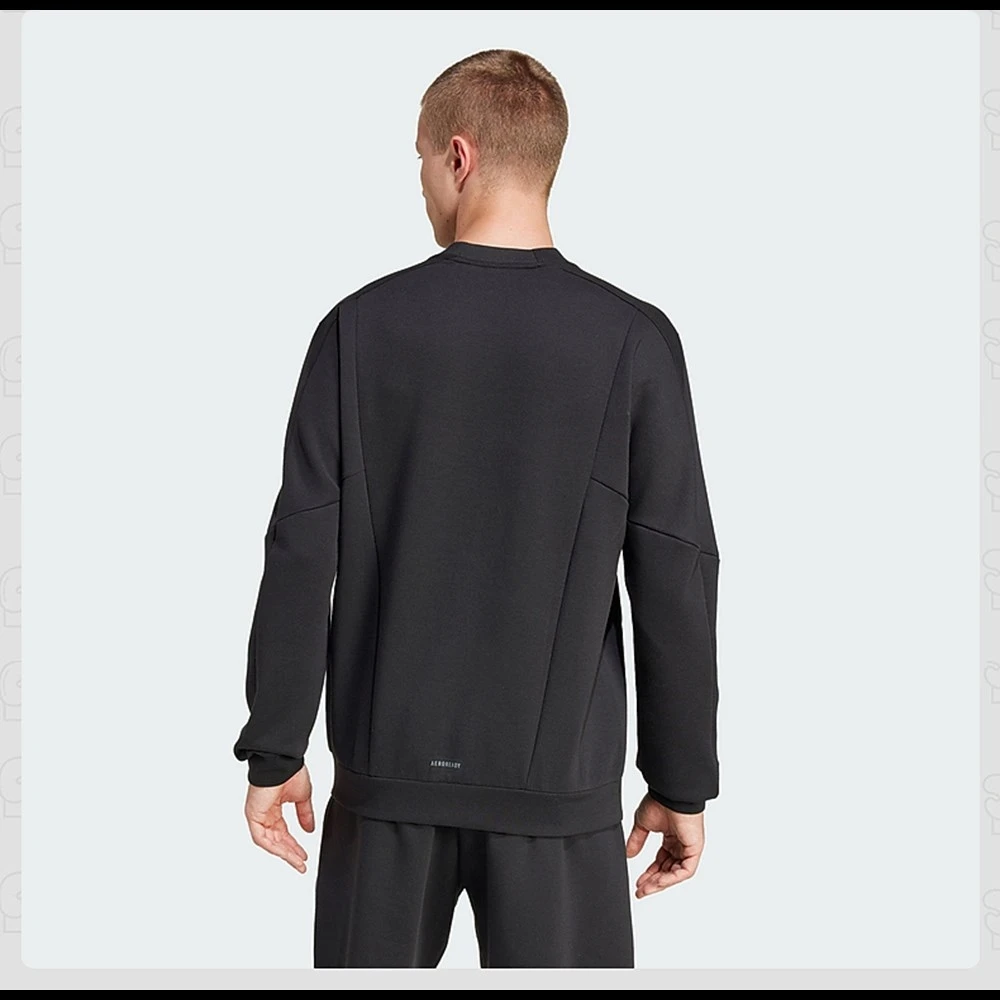 Adidas Men's Black Crew - Neck Sweatshirt: Made with soft, breathable fabric. Features the iconic Adidas logo on the chest. Clas