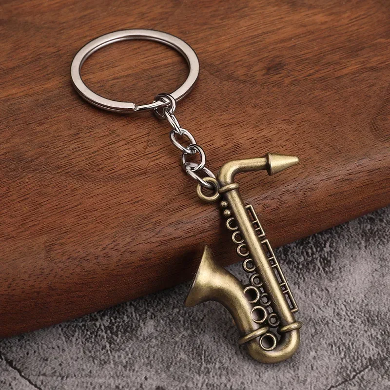 Mini instrumentos musicales en miniatura, saxofón, Mini llavero de Metal, colgante, regalo de música