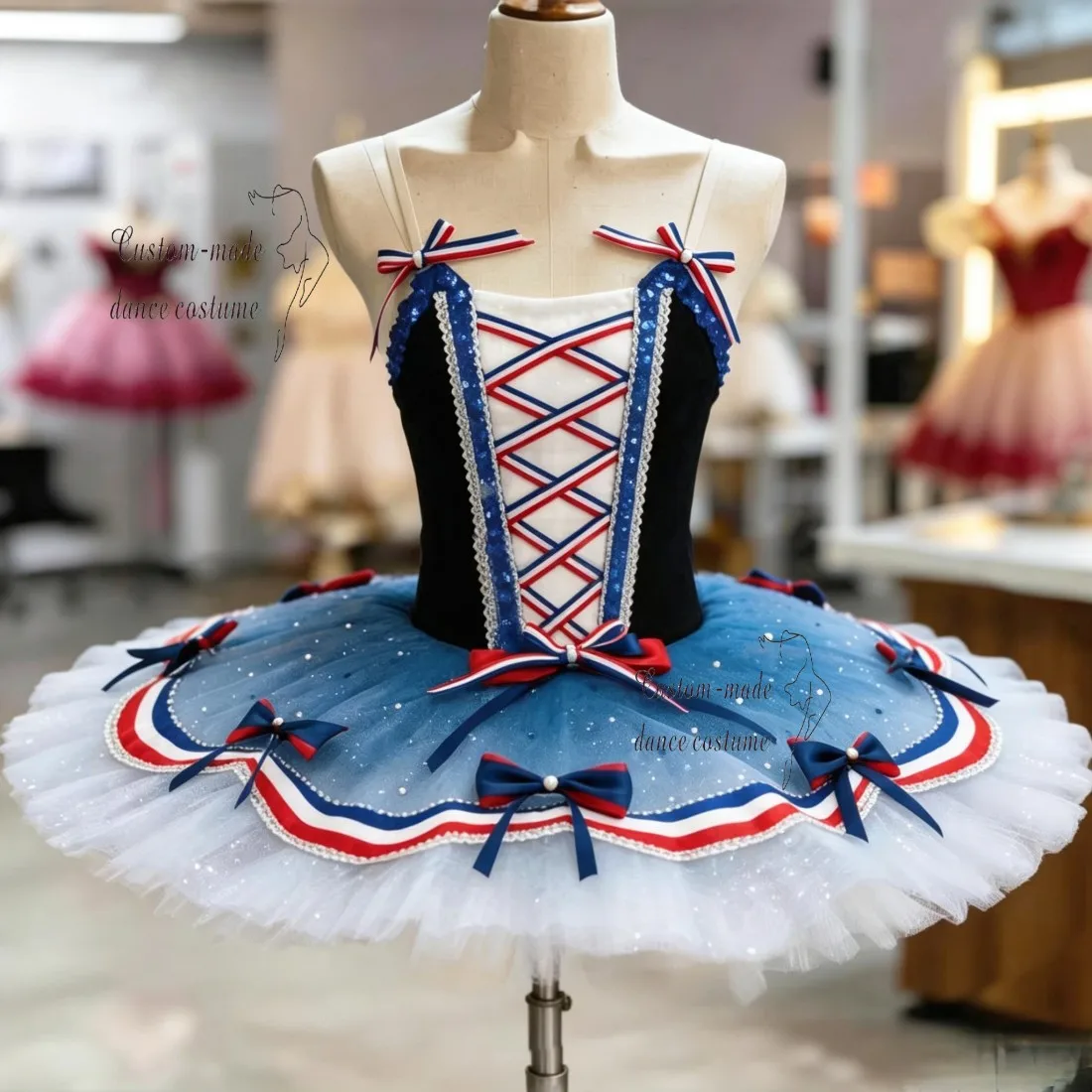 

Custom Nutcracker soldier-style ballet costume, black corset bodice with patriotic lacing detail, layered ombre blue tutu tailor