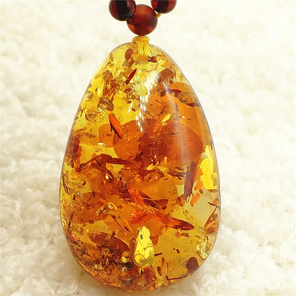 

Natural Yellow Piebald Amber Round Pendant Flower Yellow Amber Women Men 36x23x14mm Jewelry Stone Baltic AAAAAAA