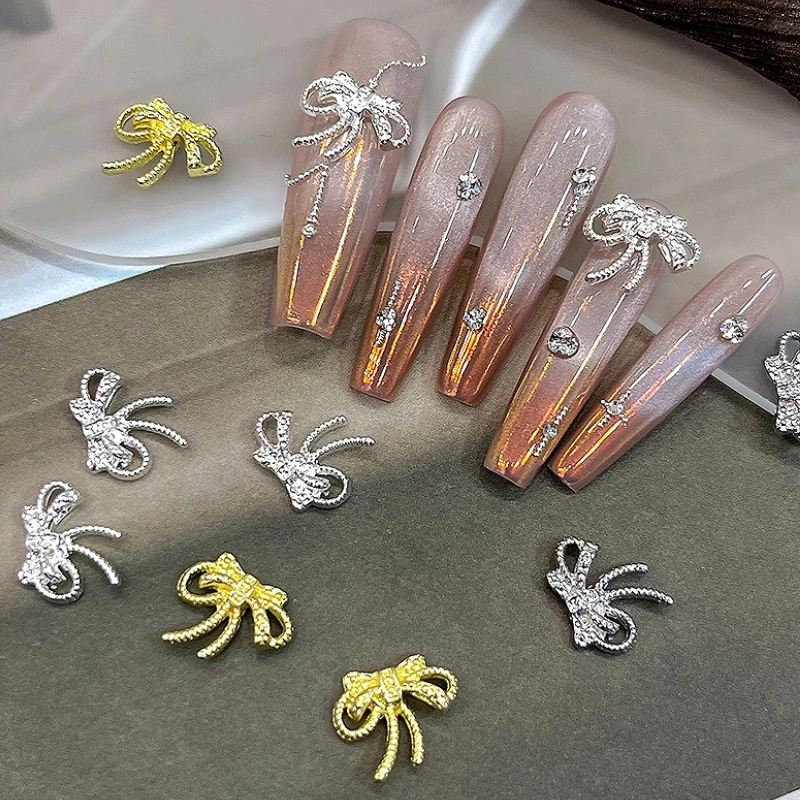 

Delicate Gold Silver Bowknot Jewelry Ribbon Bow Tie Cute Metal Alloy Nail Art Decorations Charms Manicure Accessories Wholesale