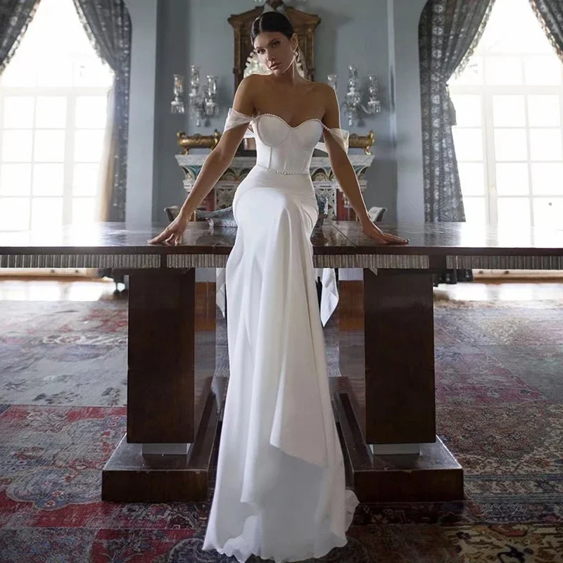 Elegante bruidsjurken geborduurd kant op net met zeemeerminstrand strapless mouwloze trouwjurken knoopgewaden de marée