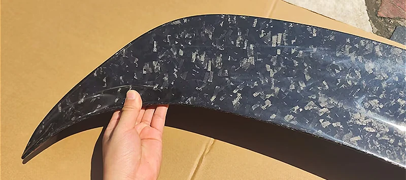 Forged carbon surface detail