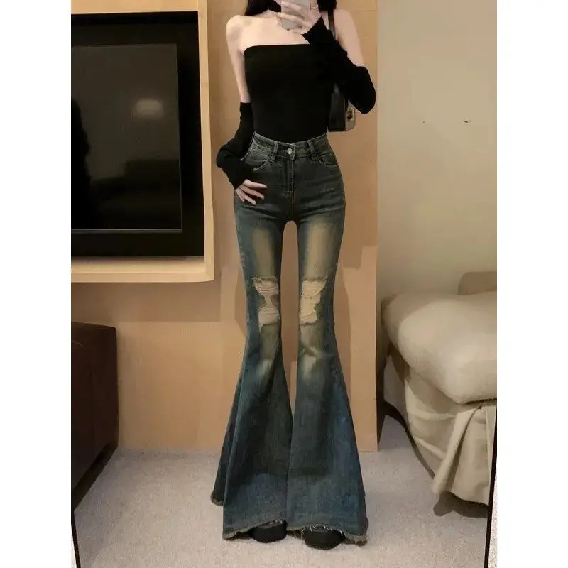 Retro Hong Kong style fishtail flared jeans, women's high-waisted slim niche design sense ripped mop wide-leg trousers