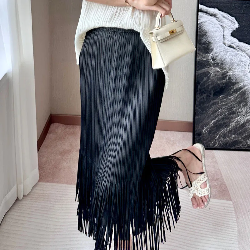 

Miyake Pleated Women's Casual Skirt 2026 New Japanese Design Solid Color Tassel Elastic Waist Bag Hip Skirt