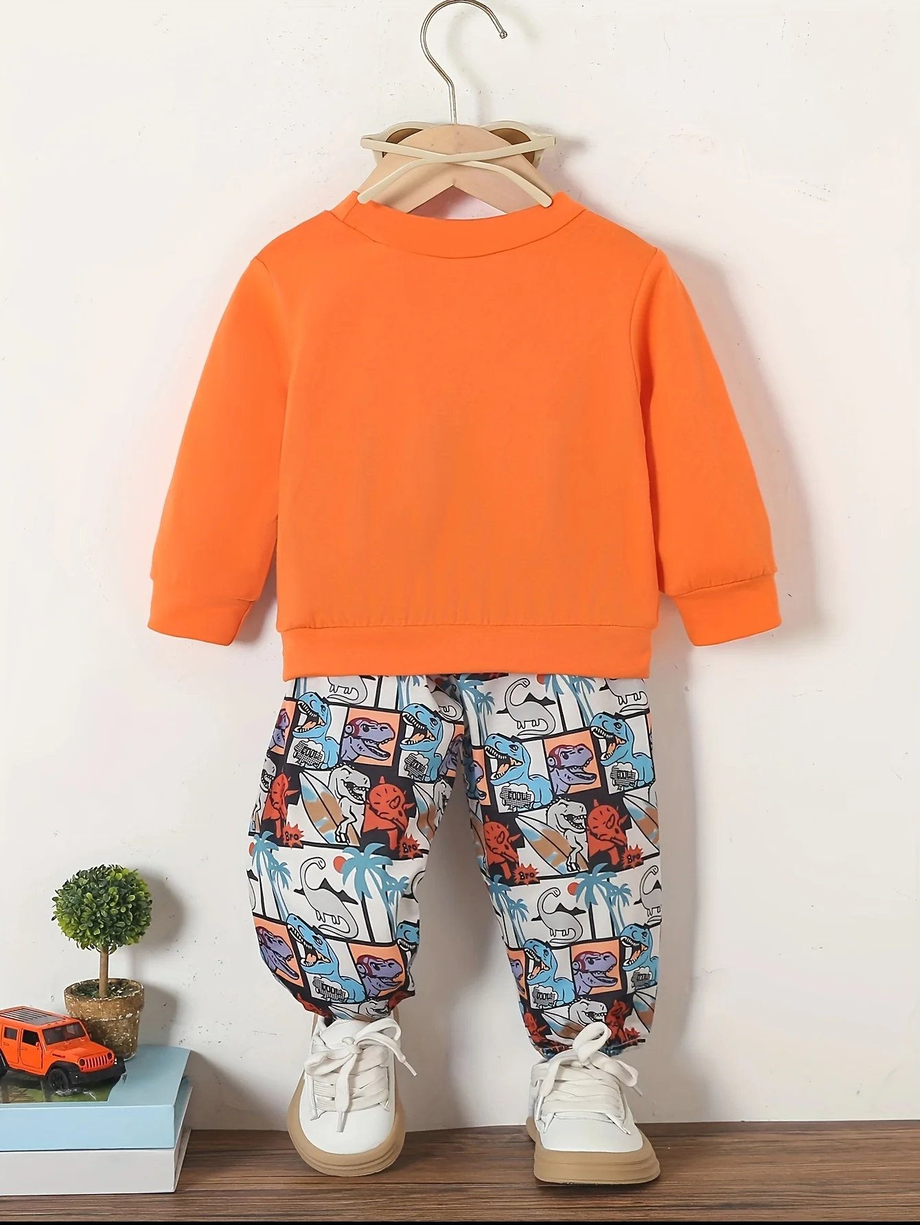 Spring And Autumn Cartoon Dinosaur Print Orange Long Sleeve Full Print Pants Fabric Soft Suitable For Outdoor And Base Wear Suit