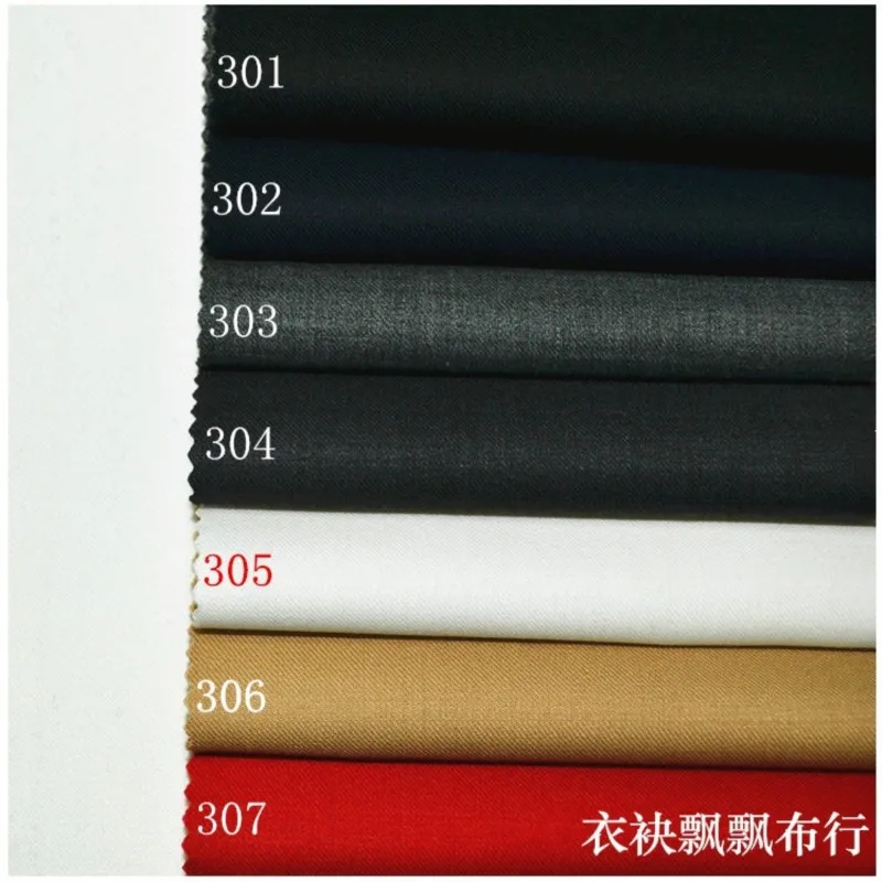 The suit is made of high-count fine-spun black cyan white and bright red fabric for trousers skirts