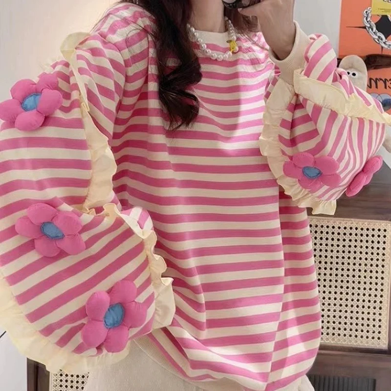 Dopamine striped three-dimensional flower pink top women's autumn and winter new long-sleeved color matching pullover sweater