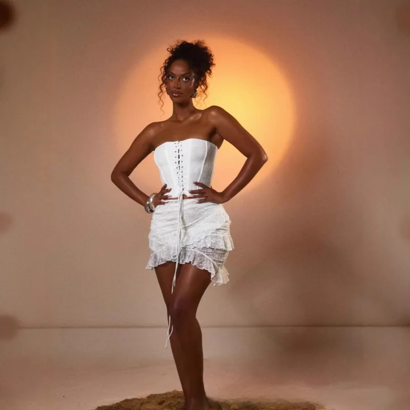 Conjunto de falda ajustada de encaje con tirantes de espina de pescado elegante a la moda europea y americana para mujer nuevo