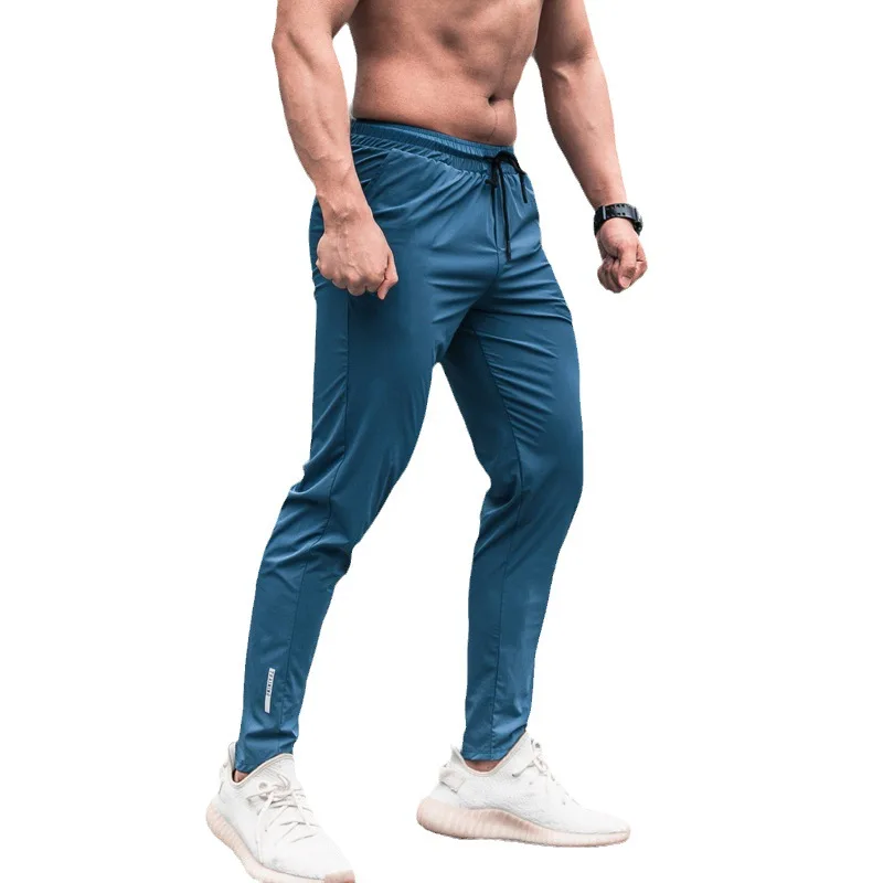 Pantalones deportivos ligeros elásticos para primavera y verano, pantalones de pierna ajustados de Color sólido, pantalones deportivos informales para Fitness