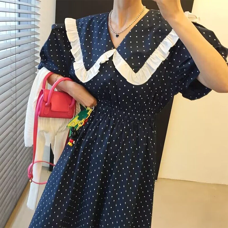 Clothland Women Sweet Polka Dot Midi Dress Ruffle Peter Pan Collar Short Sleeve White Black Retro Mid Calf Dresses Mujer QC129