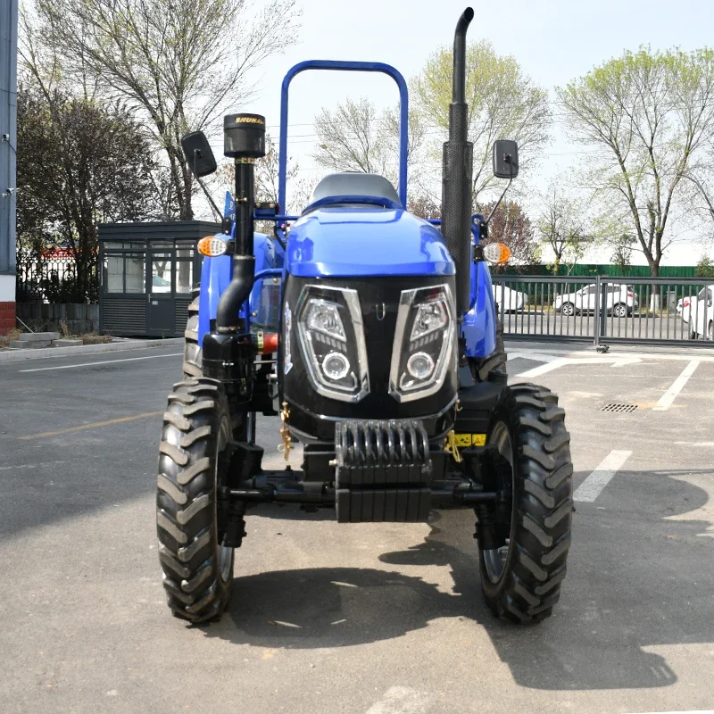 Vendita economica e calda Piccolo trattore a quattro ruote contenente attrezzi agricoli Mini trattore 4x4 Trattore coltivatore a quattro ruote motrici