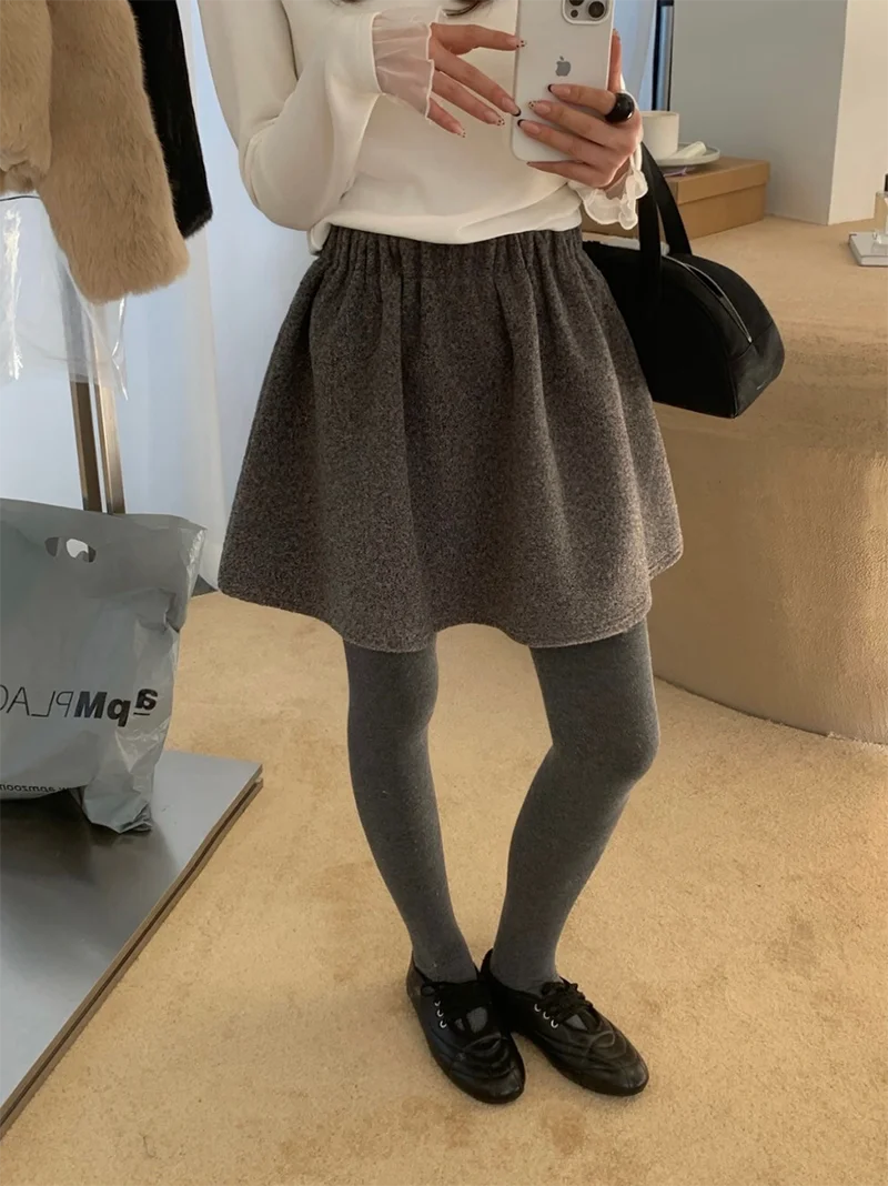 

Корейская шерстяная пышная юбка в стиле ретро, женская осенне-зимняя новая эластичная талия, утягивающий бедра, закрывающий рост, зонтик...