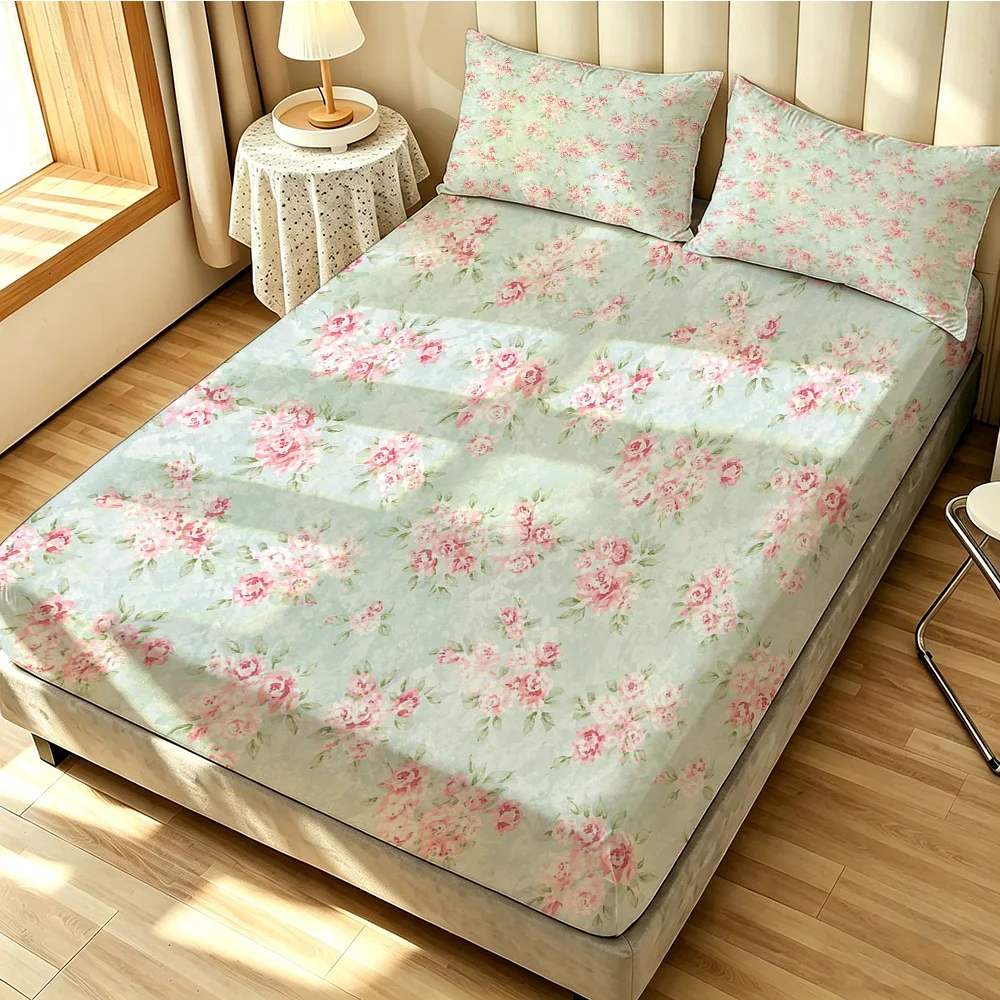 A Three-Piece Bedding Set Including A Bedspread with A Pink Floral Pattern and Two Pillowcases