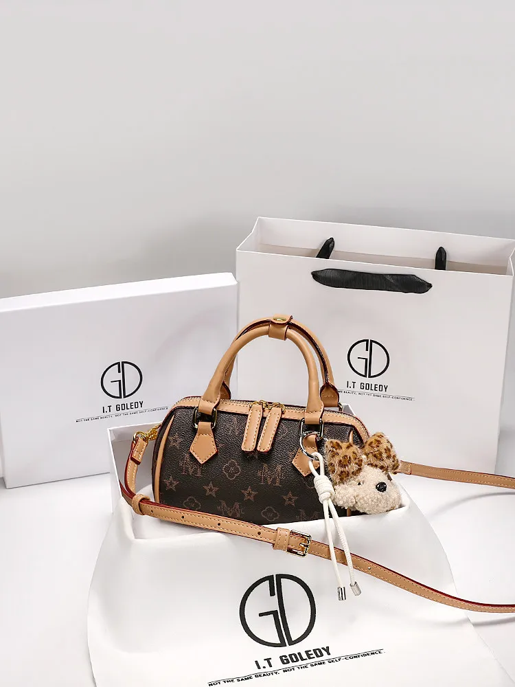 

Vintage and Luxury Handheld Boston Bag with Classic Flower Printing and Cute Pendant 2026 Women New Fashion Single Shoulder Bag