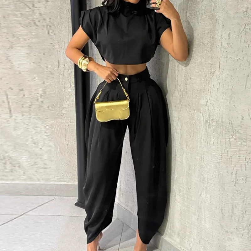 

Офисный сексуальный комплект из двух предметов с открытым пупком, черный свободный летний женский наряд, модный топ с круглым вырезом и короткими рукавами, костюм с длинными брюками