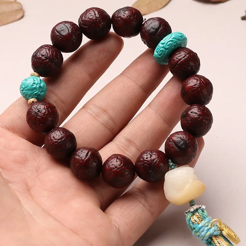

Polished Agate-like Natural Bodhi Bracelet: Nepalese Phoenix Eye Beaded Handheld Jewelry with Bodhi Root Accents, Gift Option