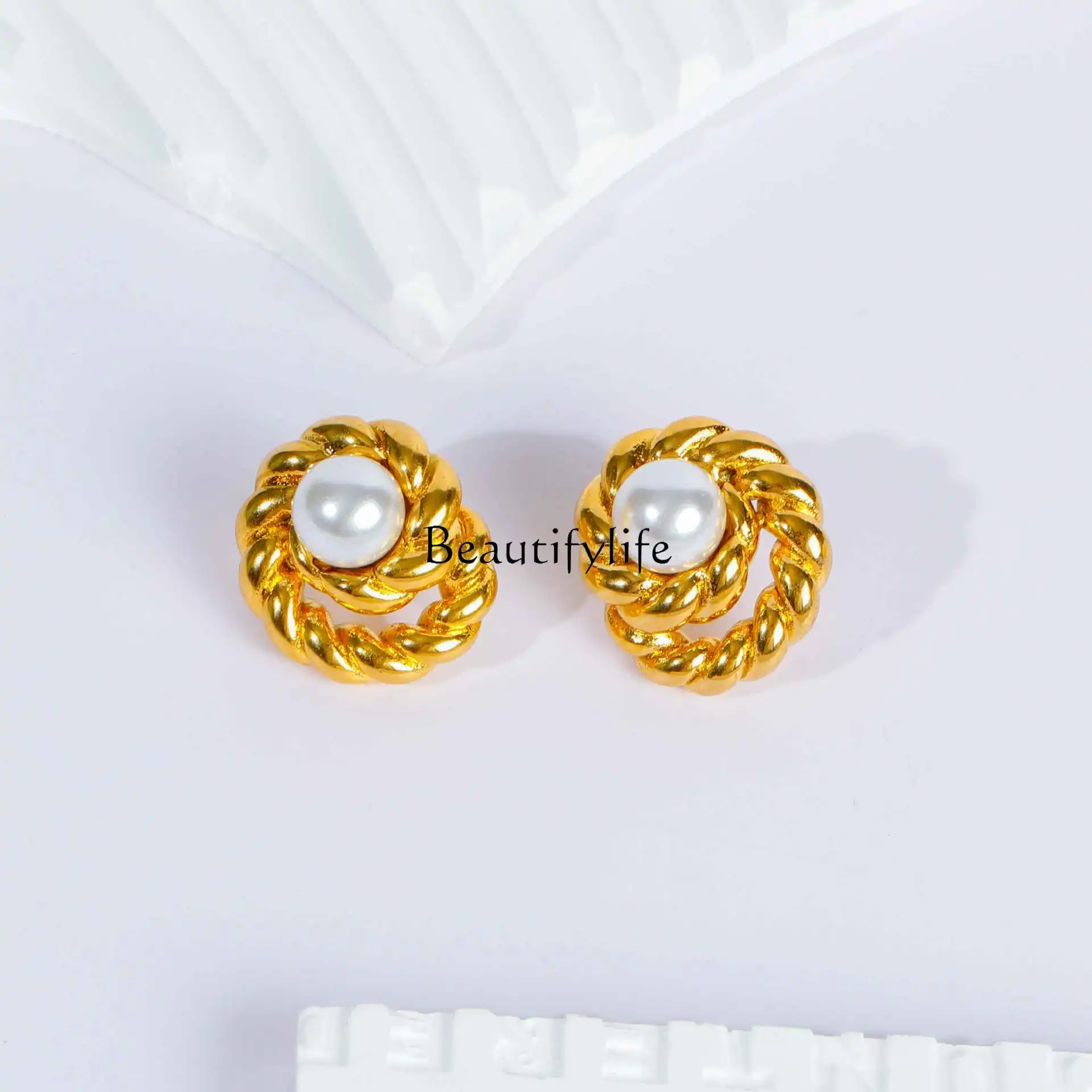 

Retro round twist pearl stud earrings women's light luxury high-end sense medieval exaggerated personalized earrings