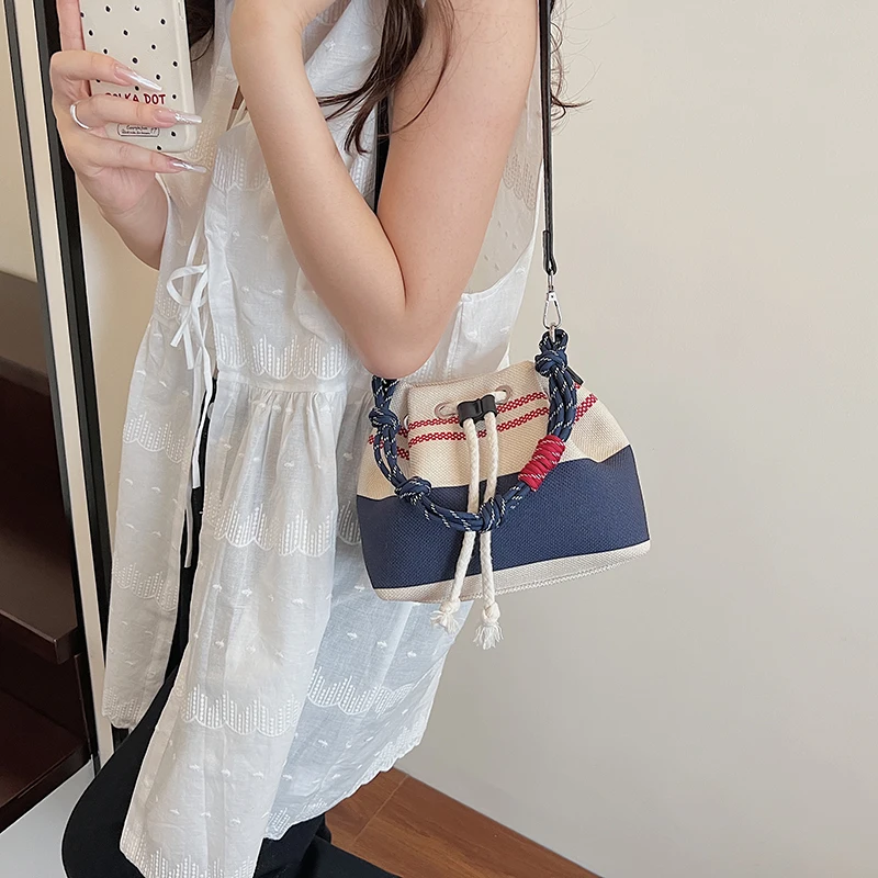 Wysokiej jakości damskie płócienne torebki typu bucket bag, codzienne małe torebki na ramię, modne nowe torebki crossbody dla kobiet.