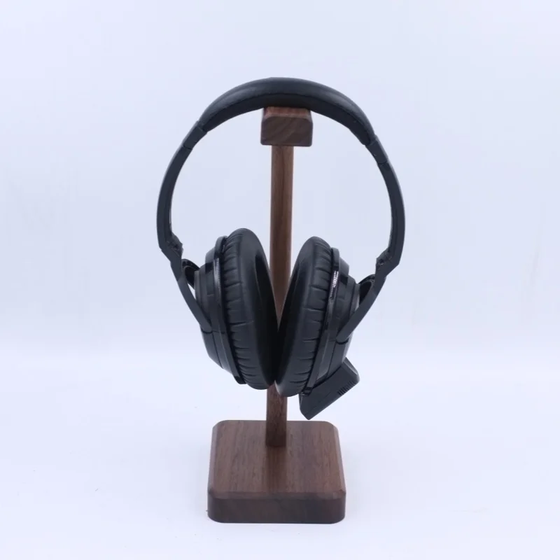 แผ่นไม้วอลนัทสีดำขาตั้งหูฟังอเนกประสงค์สำหรับนักเล่นเกมหูฟังเกมเครื่องประดับฐานแบบหนา