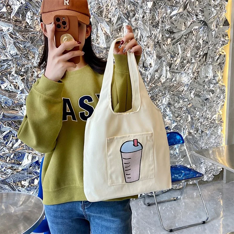 

Cartoon Printed Canvas Bag | Y2K Harajuku Style for Students | Large Capacity Versatile Single-Shoulder Tote