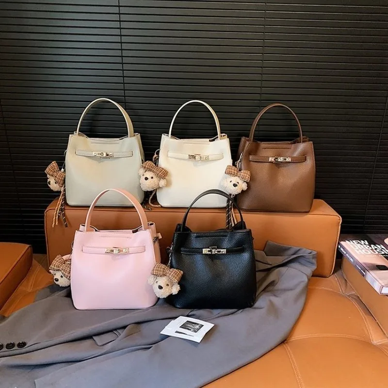 

2026 Women's Lock Shoulder Tote with Detachable Charm in Coffee Gray Beige Pink Black Versatile for Work & Day