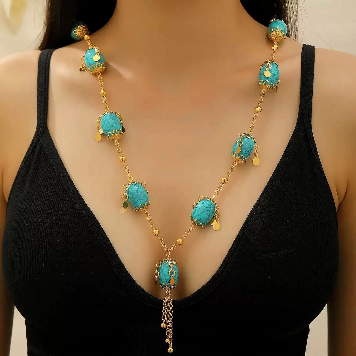 

A Striking Blue Round Ball Chain Pendant, A High-End Long-Length Collar Necklace, And A Retro Court Style Sweater Chain.