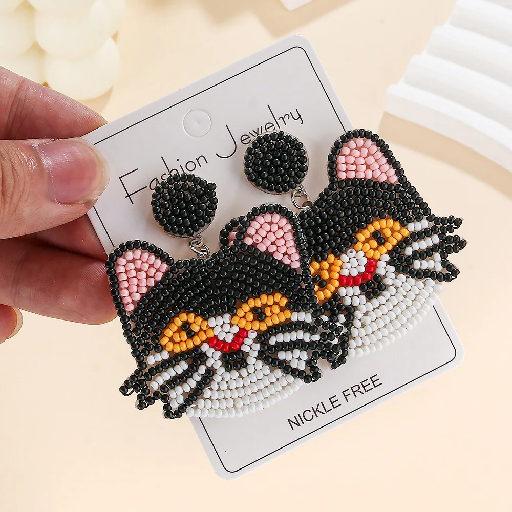 

Beaded earrings Fabric Tiger Cat Pattern Hand weaving Creativity Bohemia Alloy Female Trend Versatile Rice bead earrings