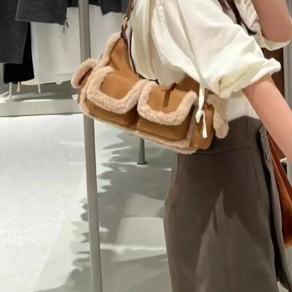 

Korean style retro cat hair underarm locomotive bag autumn and winter new splicing multi-pocket single shoulder commuter bag