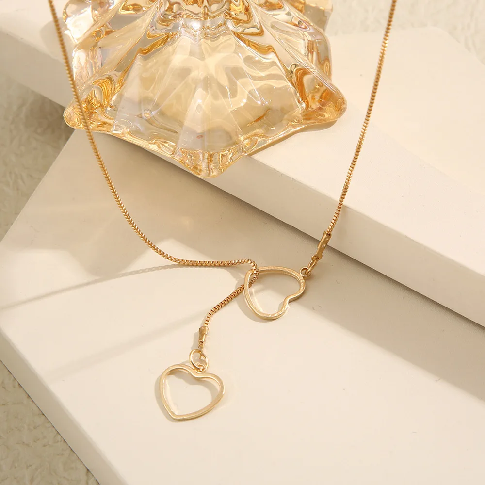 1Pcs New Minimalist Hollowed out Double Ring Heart-Shaped Necklace for Women, Fashionable, Versatile, And High-End Accessories