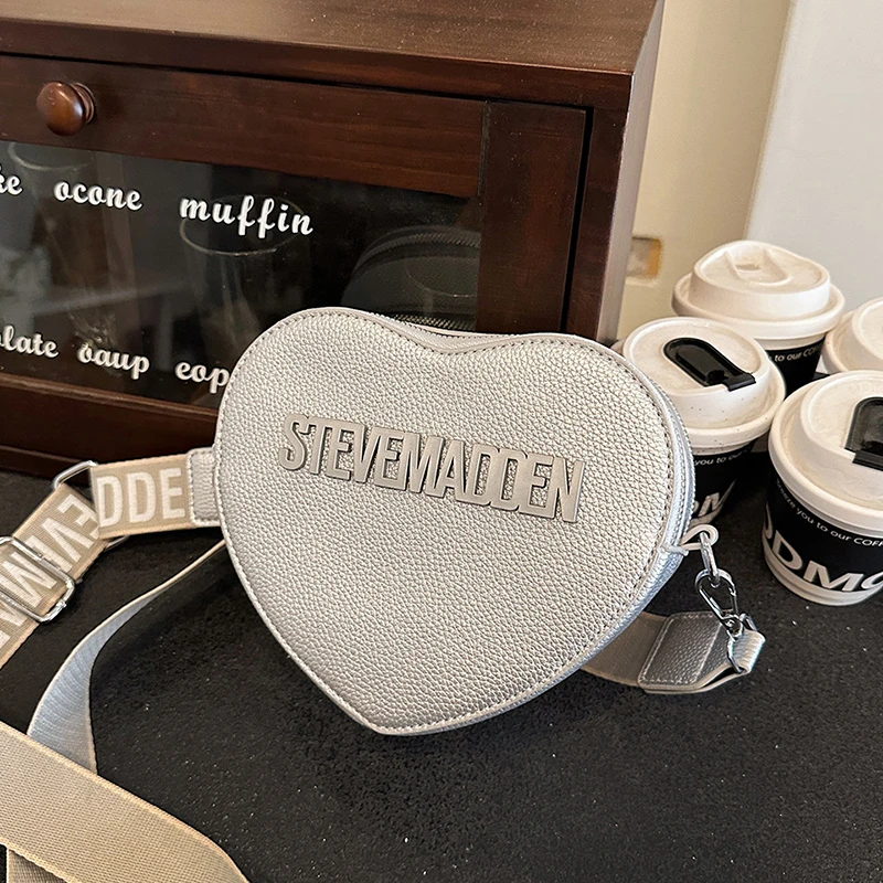 Contemporary Saddle Shoulder Bag In Buttery Soft Leather Streamlined Design For Gallery Visits And Business Luncheons