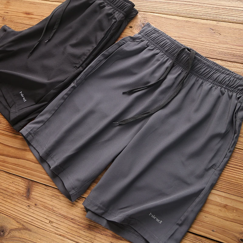 

Легкие дышащие мужские летние шорты-бриджи из быстросохнущей эластичной ткани свободного кроя для спорта и повседневной носки